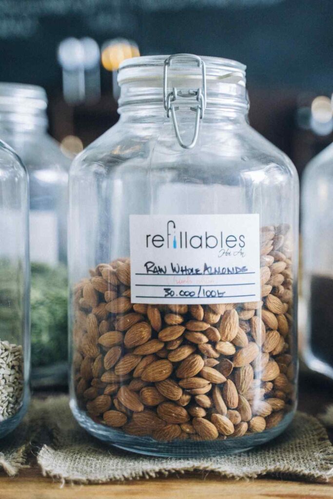 "Almonds shown in various forms with nutritional facts and culinary applications highlighted"