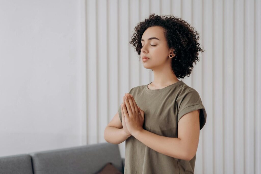 Person meditating peacefully in morning light to support vagus nerve function