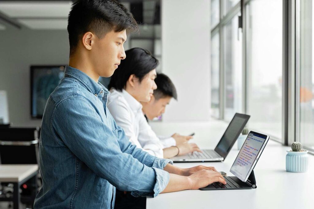  Medical illustration showing side-by-side comparison of correct neutral spine posture versus forward head posture and rounded shoulders posture and health 2026
